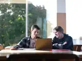 2 students studying together